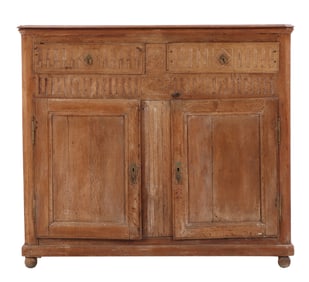 A RESTRAINED NINETEENTH CENTURY FRENCH OAK SERVER HAVING TWO DRAWERS OVER TWO DOORS.
