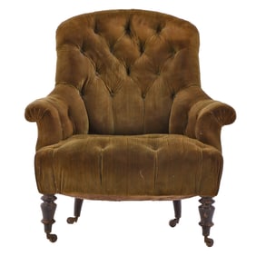 NINETEENTH CENTURY NAPOLEON III LIBRARY CHAIR HAVING BUTTON BACK UPHOLSTERY AND EBONIZED AND