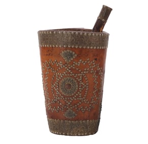 LEATHER, WOOD, AND BRASS MORTER AND PESTLE.