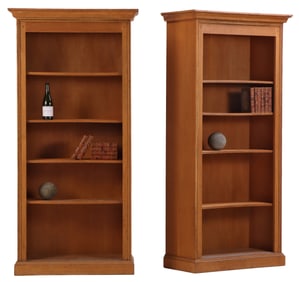 A PAIR OF ONE PIECE ITALIAN OAK OPEN BOOKCASES.