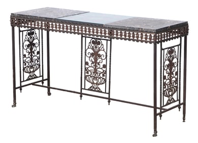 AN OSCAR BACH ATTRIBUTED WROUGHT IRON CONSOLE TABLE HAVING GILT ACCENTS AND A MARBLE TOP CIRCA