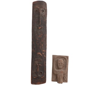 TWO PRIMITIVES INCLUDING SPIRIT BOARD AND CARVED WOOD SHIELD WITH FACES, SOURCED FROM BORNEO 1970
