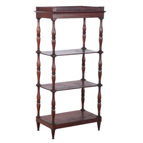 NINETEENTH CENTURY TURNED MAHOGANY ETEGERE IN THE MANNER OF JACOB.