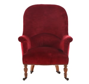 WILLIAM IV LIBRARY CHAIR HAVING A CURVED BACK AND RESTING ON CARVED FEET C 1840.