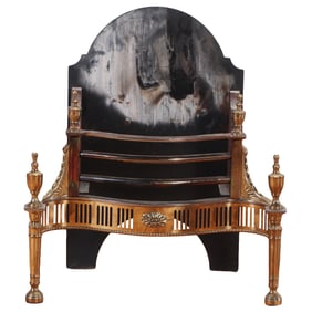 A GEORGE III STYLE IRON AND BRASS FIRE GRATE.