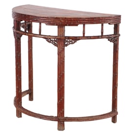 A NINETEENTH CNETURY ASIAN FAUX BAMBOO DEMILUNE CONSOLE TABLE.
