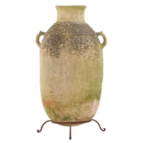 TERRACOTTA OLIVE JAR ON IRON BASE C 1940.