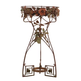 POLYCHROMED ART NOUVEAU STYLE WROUGHT IRON PLANTER WITH FLORAL MOTIF.