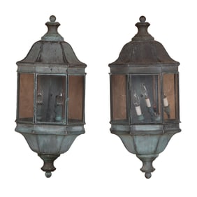PAIR OF COPPER AND GLASS WALL MOUNT LANTERNS.