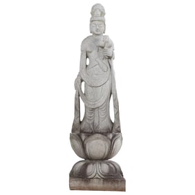 80" CARVED GRANITE FIGURE RESTING ON A TWO PART CARVED LOTUS LEAF PEDESTAL.