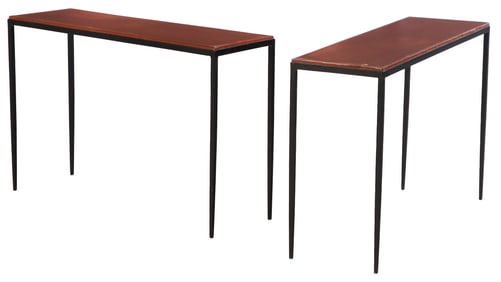 PAIR IRON AND HAND STITCHED LEATHER CONSOLE TABLES IN THE MANNER OF JEAN-MICHEL FRANK.