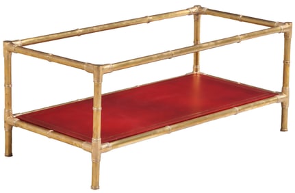 BRASS FAUX BAMBOO COFFEE TABLE HAVING A RED LEATHER GILT EMBOSSED LOWER SHELF AND A GLASS TOP