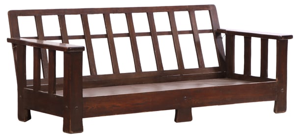 A RUSTIC OAK SOFA C 1900.
