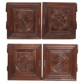FOUR SUBSTANTIAL WALNUT CABINET DOORS IN THE MANNER OF CHARLES DUDOUYT.