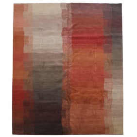 A MODERN TIBETAN WOOL AREA RUG 6' X 9'