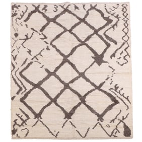 A MOROCCAN STYLE AREA RUG 5'2" X 8'2"