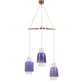 MIDCENTURY MODERN TRIPLE PENDANT HANGING LIGHT HAVING PURPLE AND WHITE GLASS GLOBES. C 1960