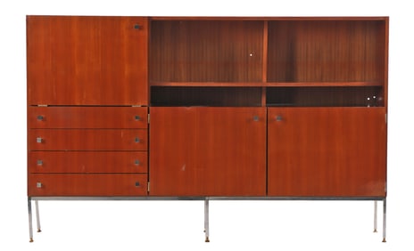 FRENCH MAHOGANY CABINET BOOKCASE HAVING FALL FRONT DESK RESTING ON A CHROMED IRON BASE C 1955.