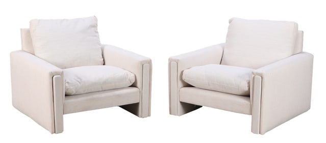 PAIR OF UPHOLSTERED LOUNGE CHAIRS C 1970 HAVING NEW FABRIC.