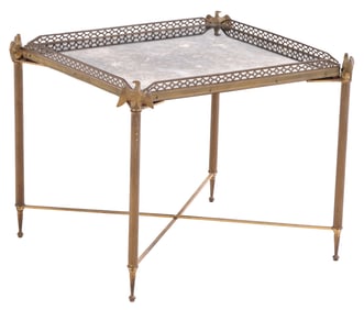 FRENCH BRASS END TABLE WITH EAGLE DECORATION AND HAVING A MOTTLED MIRROR TOP C 1950.