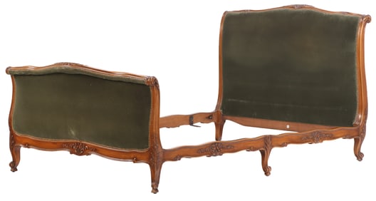 FRENCH CARVED WALNUT LOUIS XV STYLE GREEN UPHOLSTERED BED HAVING SIX LEGS C 1940.