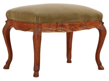FRENCH CARVED OAK UPHOLSTERED STOOL WITH HOOVED FEET C 1910.