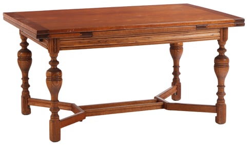 OAK DRAW LEAF DINING TABLE HAVING TWO LEAVES.