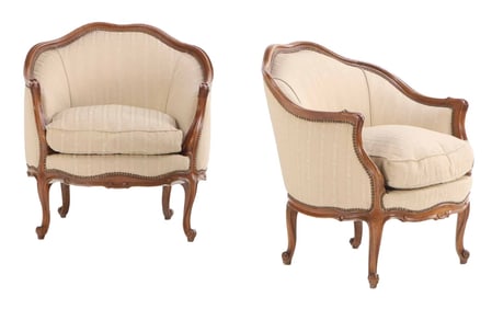 A PAIR OF LOUIS XV STYLE UPHOLSTERED BERGERE CHAIRS C 1950.