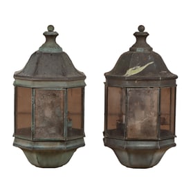 PAIR OF COPPER AND GLASS WALL MOUNT LANTERNS.