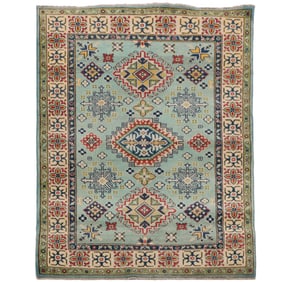 AN UZBEK KAZAK AREA RUG 4' X 5'10"