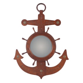 A LARGE NAUTICAL THEMED WALNUT MIRROR HAVING SHIP'S WHEEL FORM GLASS ABOVE A STYLIZED ANCHOR.