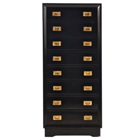 EBONIZED CAMPAIGN STYLE EIGHT DRAWER CHEST OF DRAWERS HAVING INSET BRASS HANDLES C 1960.