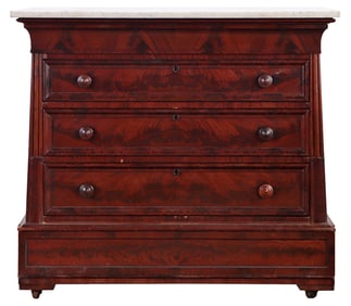 EGYPTIAN REVIVAL CROTCH MAHOGANY MARBLE TOP DRESSER HAVING A MARBLE TOP C 1840.