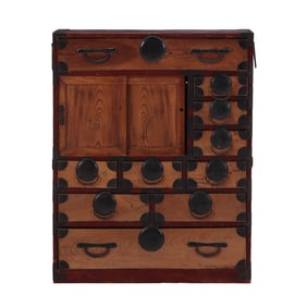 A JAPANESE ELM CHEST WITH DRAWERS AND DOORS HAVING IRON MOUNTS.