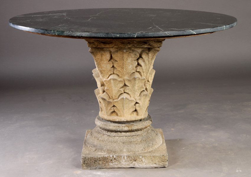 MARBLE TOP GARDEN DINING TABLE CAST STONE: A vintage marble top garden dining table having cast stone acanthus leaf decorated central column circa 1960. Ht: 29.5" Dia: 48"