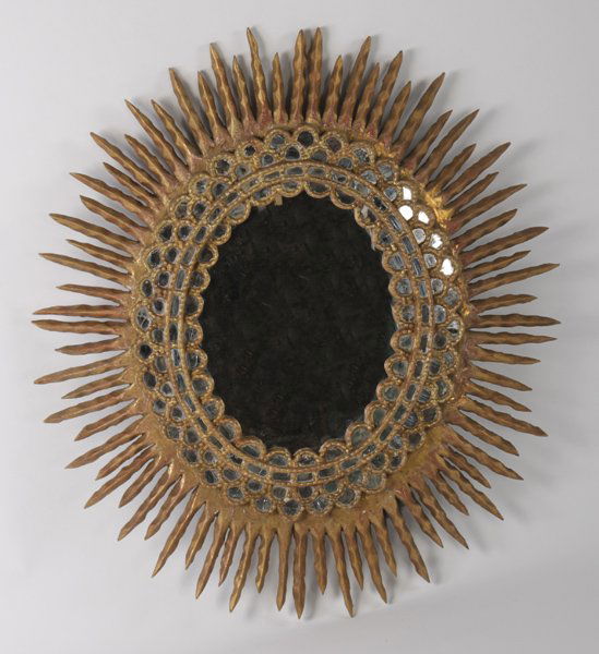 GILTWOOD AND GESSO SUNBURST MIRROR: A giltwood and gesso sunburst mirror. Ht: 39" Width: 34"
