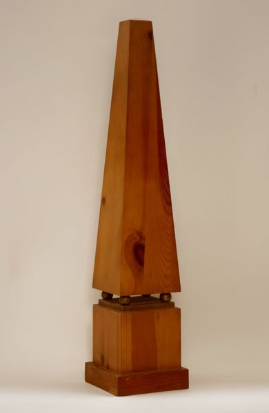 LAGE PINE & BRASS OBELISK ATOP PINE PLINTH C.1970: A large pine and brass obelisk on ball feet atop pine plinth circa 1970. Ht: 29" Width: 6" Depth: 6"