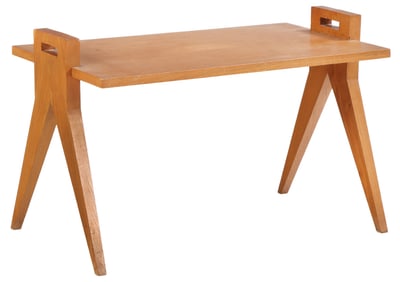 FRENCH OAK OCCASIONAL TABLE IN THE MANNER OF JACQUES ADNET C 1950.