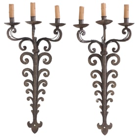 PAIR FRENCH IRON THREE ARM WALL SCONCES IN THE MANNER OF JEAN ROYERE C 1950.