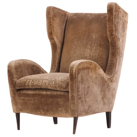 LARGE SCALE UPHOLSTERED ITALIAN LOUNGE CHAIR IN THE MANNER OF GIO PONTI C 1950.
