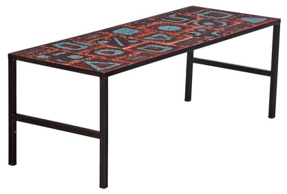 FRENCH IRON AND TILE TOP COFFEE TABLE C 1970. SIGNED BY THE ARTIST.