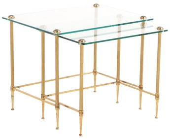 FRENCH BRASS AND GLASS NESTING TABLES IN THE MANNER OF JANSEN C 1960.