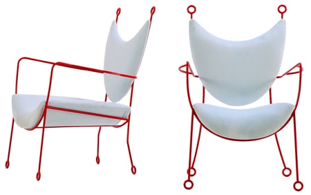 A FUN PAIR OF PAINTED IRON AND UPHOLSTERED  ARM CHAIRS IN THE MANNER OF JEAN ROYERE.