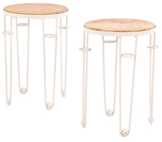 PAINTED IRON TABLES WITH SPHERE DECORATION AND INSET MARBLE TOPS IN THE MANNER OF JEAN ROYERE.