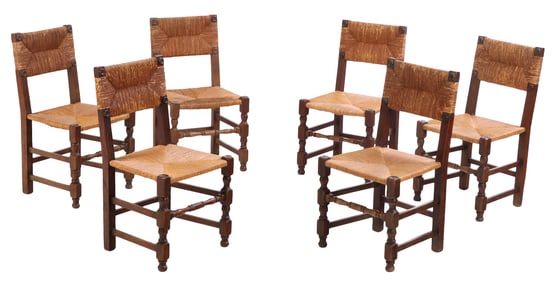 SIX FRENCH OAK AND RUSH DINING CHAIRS IN THE MANNER OF DUDOUYT C 1940 HAVING CIRCULAR MOTIFS.