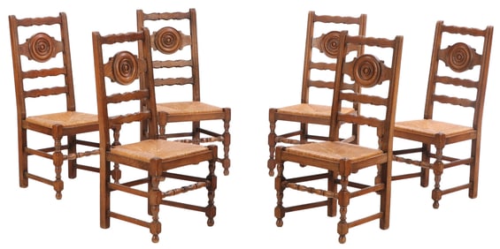 SIX FRENCH OAK AND RUSH DINING CHAIRS C 1940 IN THE MANNER OF CHARLES DUDOUYT.