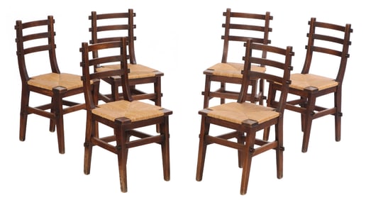 SIX FRENCH OAK AND RUSH DINING CHAIRS IN THE BRUTALIST STYLE C 1945.