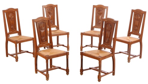 SIX FRENCH OAK AND RUSH DINING CHAIRS WITH GEOMETRIC MOTIFS IN THE MANNER OF CHARLES DUDOUYT