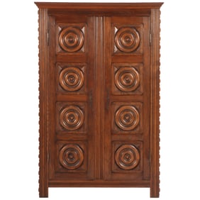 FRENCH OAK TWO DOOR CABINET IN THE MANNER OF CHARLES DUDOUYT WITH CIRCULAR DESIGN C 1940.