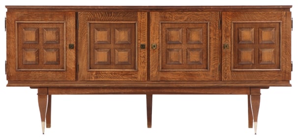 FRENCH FOUR DOOR OAK SIDEBOARD C 1940. ONE OF TWO IDENTICAL PIECES IN THIS SALE.